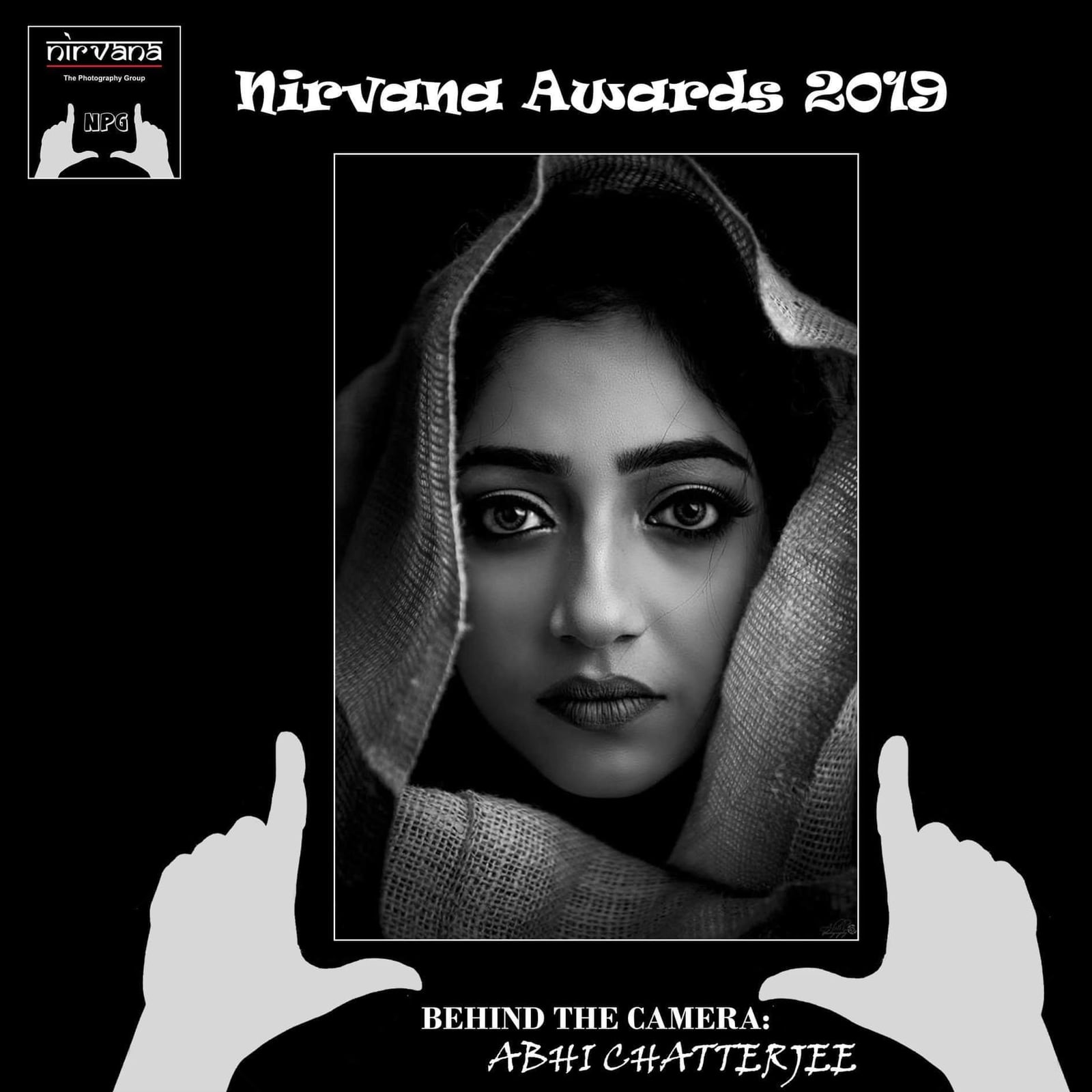 A Nirvana Awards 2019 card holding up a framed picture of a woman in a burlap hood.