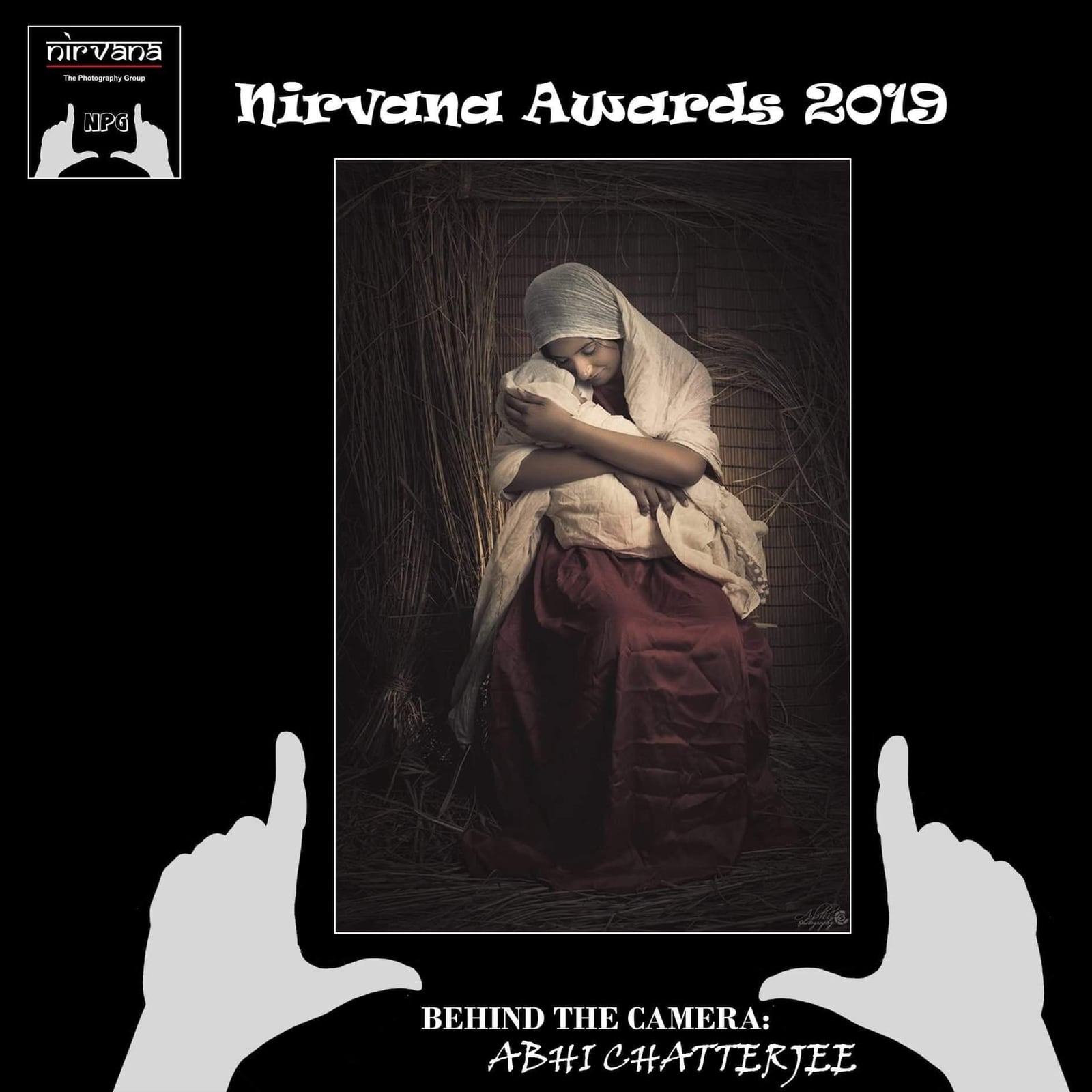 A Nirvana Awards 2019 card holding up a framed picture of a woman cradling a newborn.