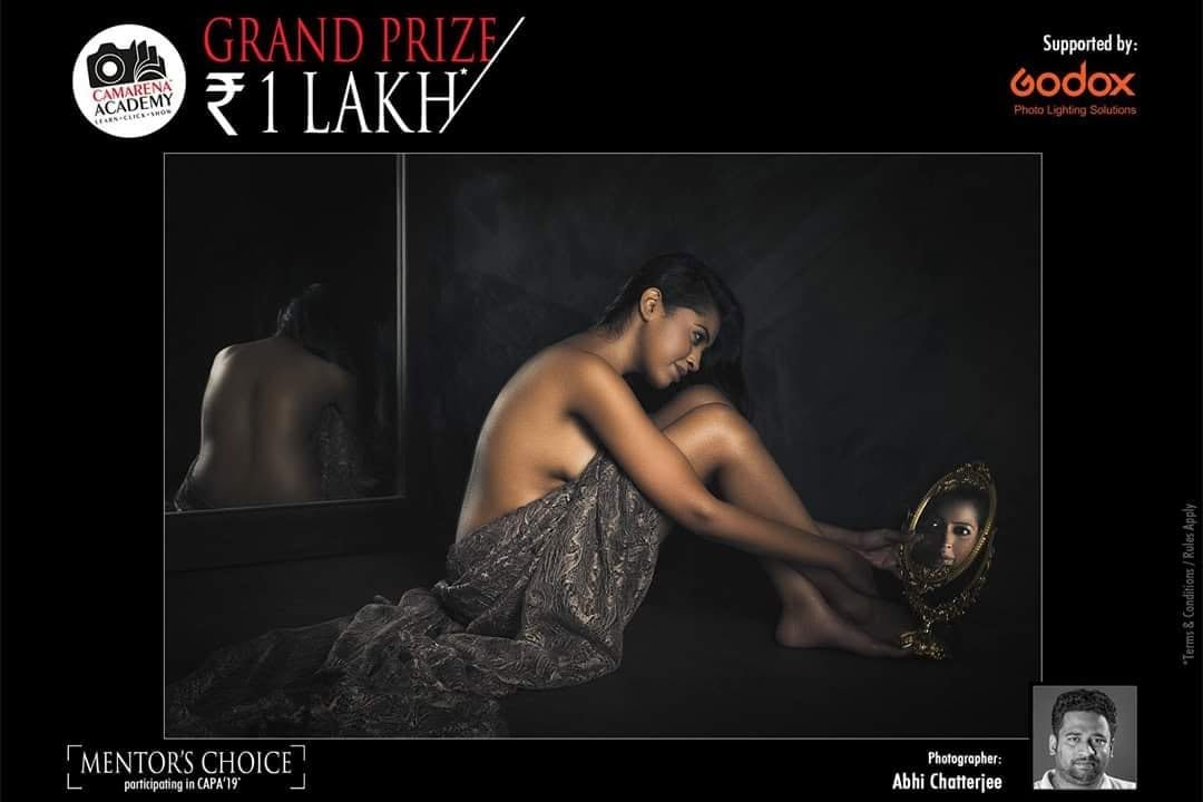A CAMARENA Academy poster marked Mentor's Choice, showing a woman reflected in a floor mirror.