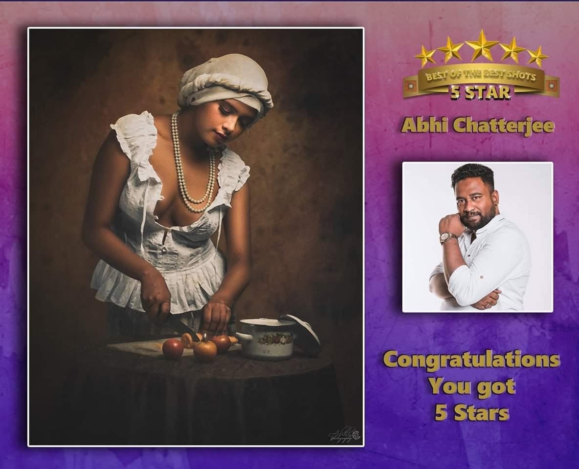 A five star congratulation card showing a framed picture of a woman in a head wrap cutting onions.