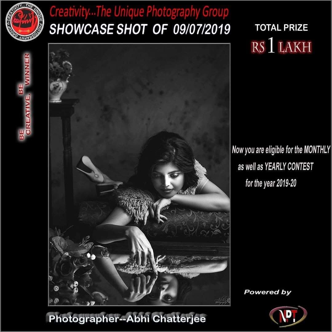 A Creativity showcase card for 9 July 2019, showing a woman leaning over a table in black and white.