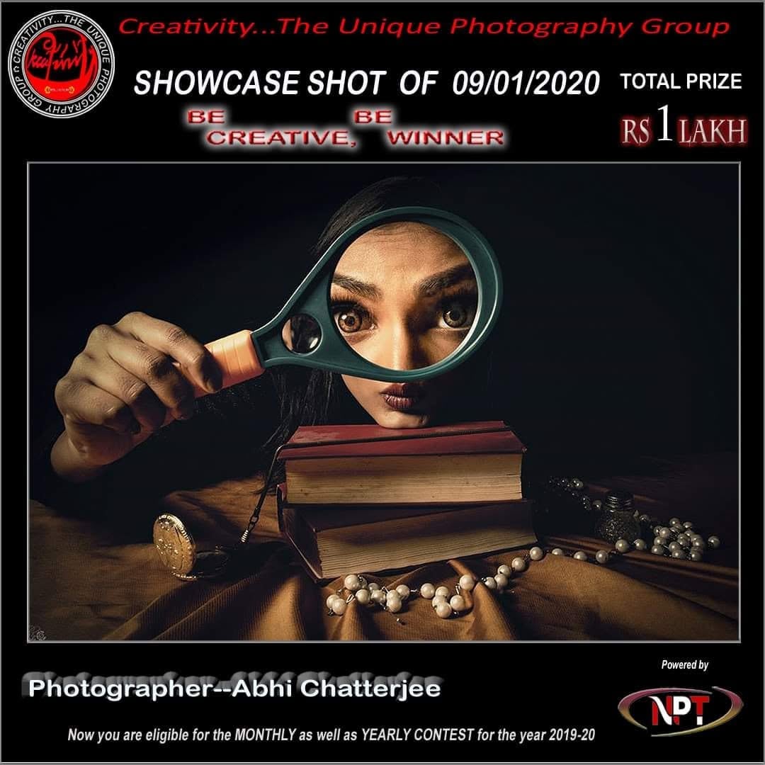 A Creativity showcase card for 9 January 2020, showing a woman holding a magnifying glass over books.
